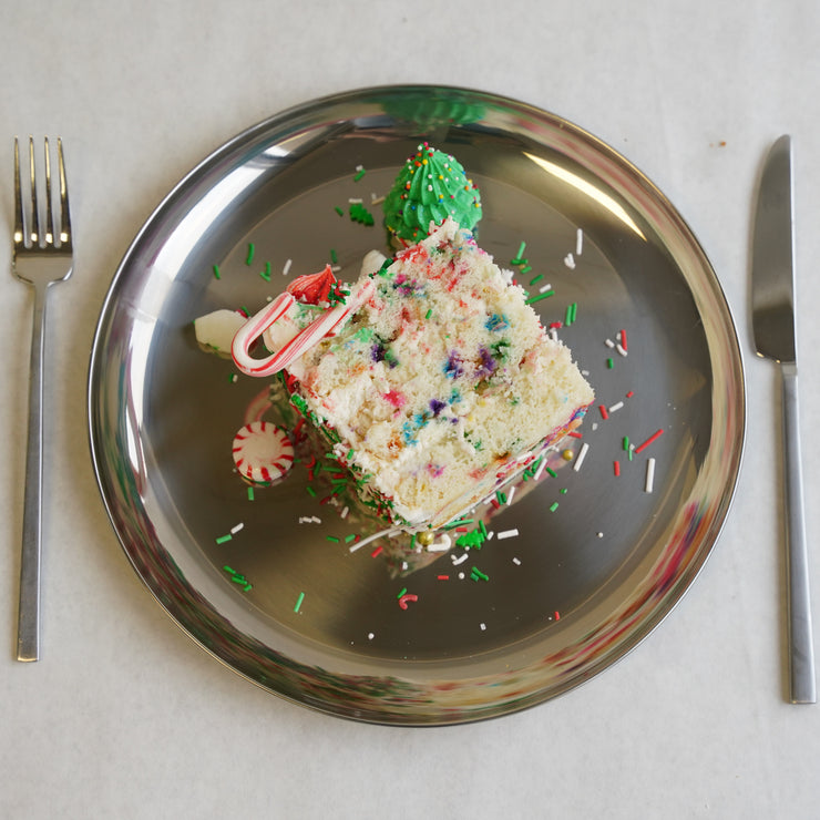 A slice of the Christmas Sheet Cake by Cades Cakes on a plate