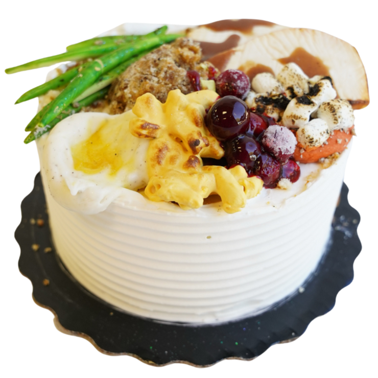 Round Cake with Thanksgiving dinner topping decorations by Cades Cakes